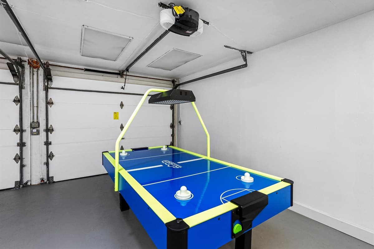 Your own mini arcade! This air hockey setup is sure to be a favorite hangout spot during your vacation.