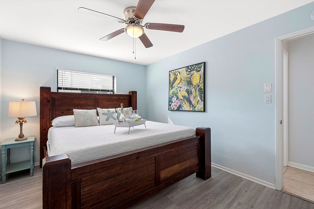 This inviting room is thoughtfully decorated in soft, calming tones, the space radiates tranquility, making it a serene retreat after a day of activities.