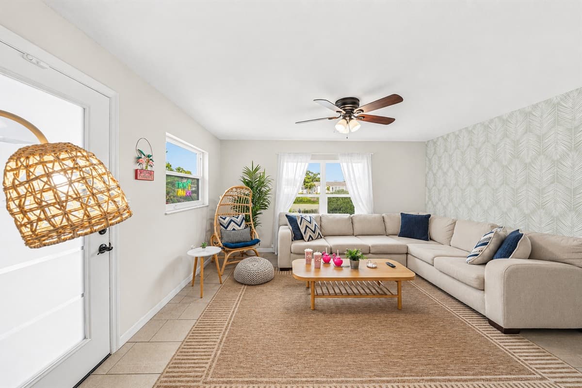 Spacious living room with large sectional seating—perfect for relaxing or gathering together.