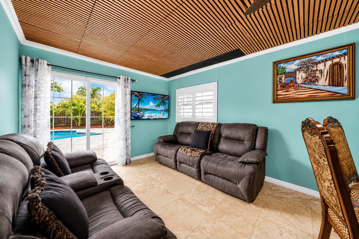 Comfortable reclining sofas and bright natural light create the perfect space to relax and unwind.