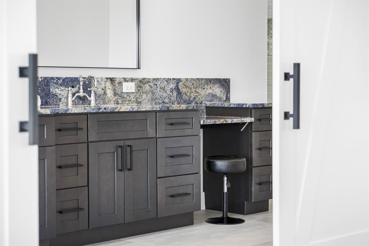 This luxurious full bathroom is designed for ultimate relaxation and convenience.