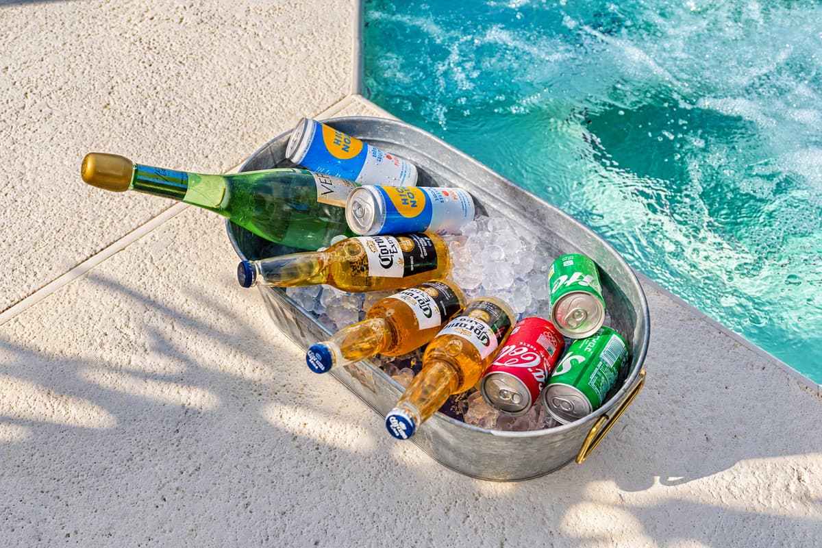 As you dine, you'll be treated to a view of the pool, where the water catches the sunlight, creating a sparkling backdrop to your meal.