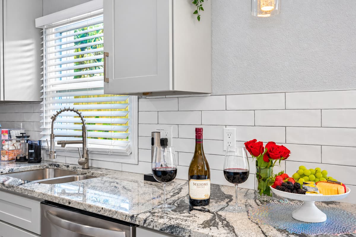 Dishwasher included, cleanup in minutes. Load the dishes, wipe the granite, and head back to the pool. Your vacation stays a vacation. The granite stays spotless with almost no effort.