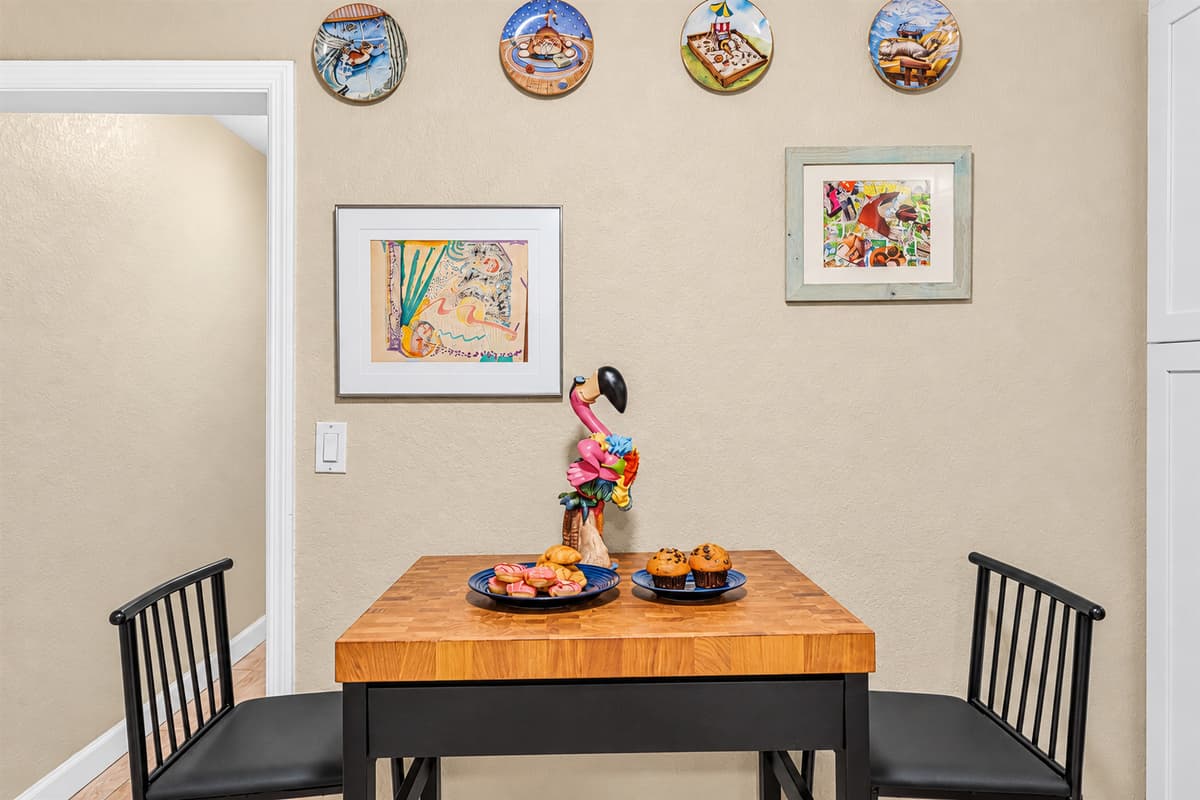 Charming dining nook with tasteful décor—great for intimate meals or morning coffee.