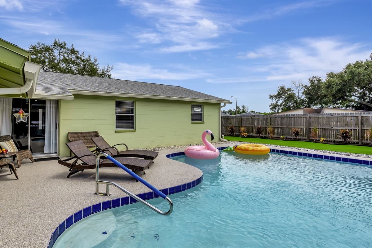 Dive into a world of aquatic bliss right in the heart of our fully fenced backyard paradise!
