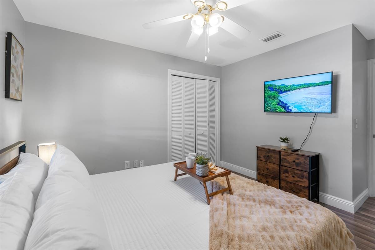 Cozy textures, minimalist décor, and a king bed make this room feel like home.