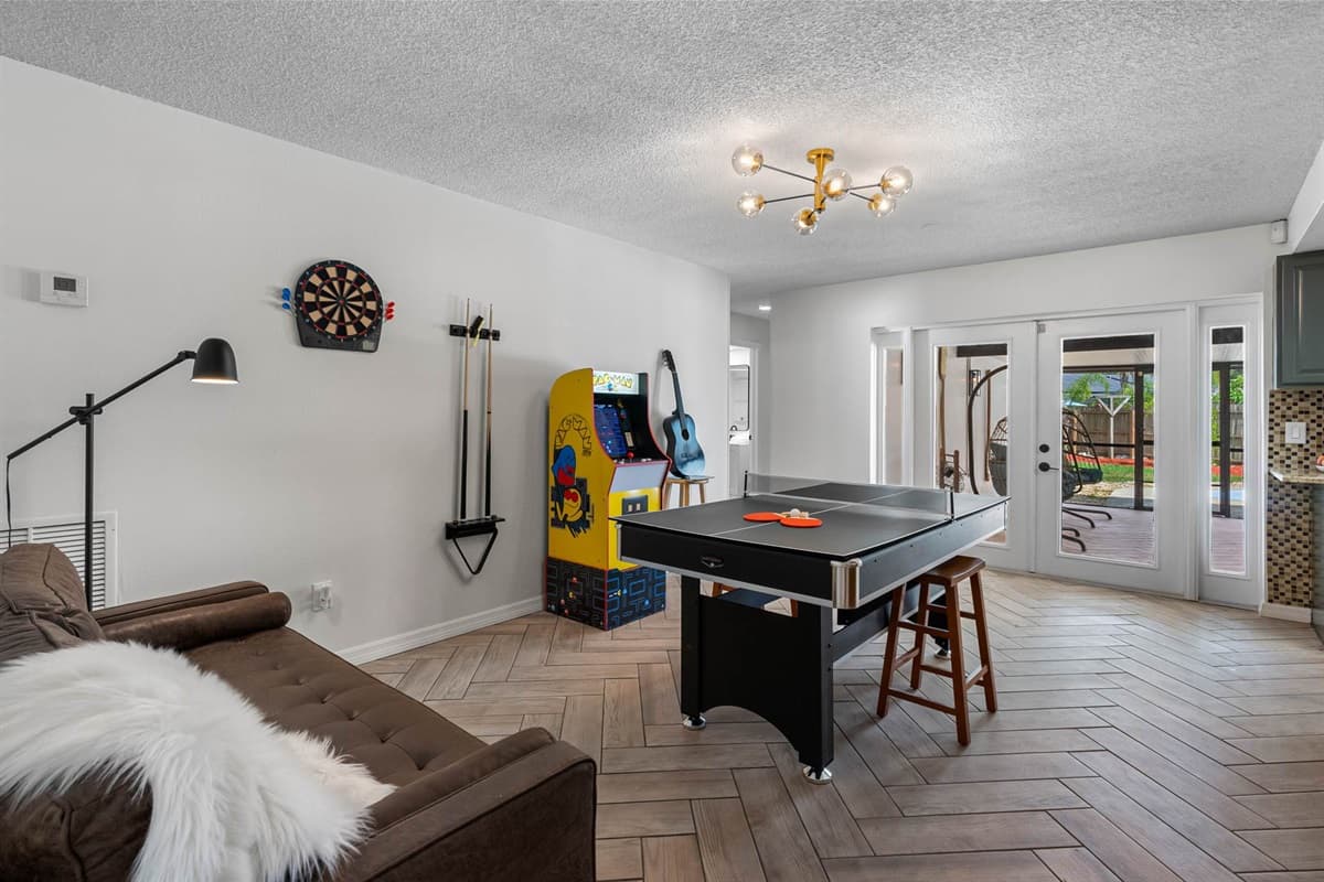 Level up your stay with a fully loaded game room! Enjoy friendly competition at the ping-pong table, test your aim with darts, or go retro with the Pac-Man arcade. There’s even a guitar for those who want to strum and chill.