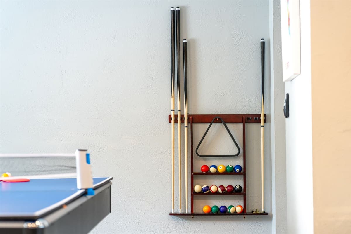 With tournament-ready tables, relaxed lounge seating nearby, and vibrant decor, this game room sets the mood for memory-making.