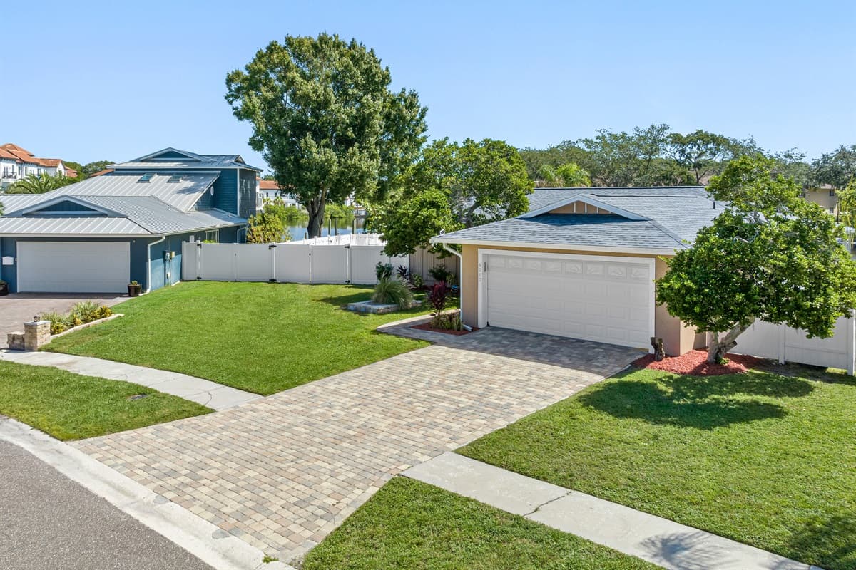 The lovely side view of the house showcasing our magnificent front yard and driveway. If you are interested in this property, don't hesitate to send us an inquiry as soon as possible!