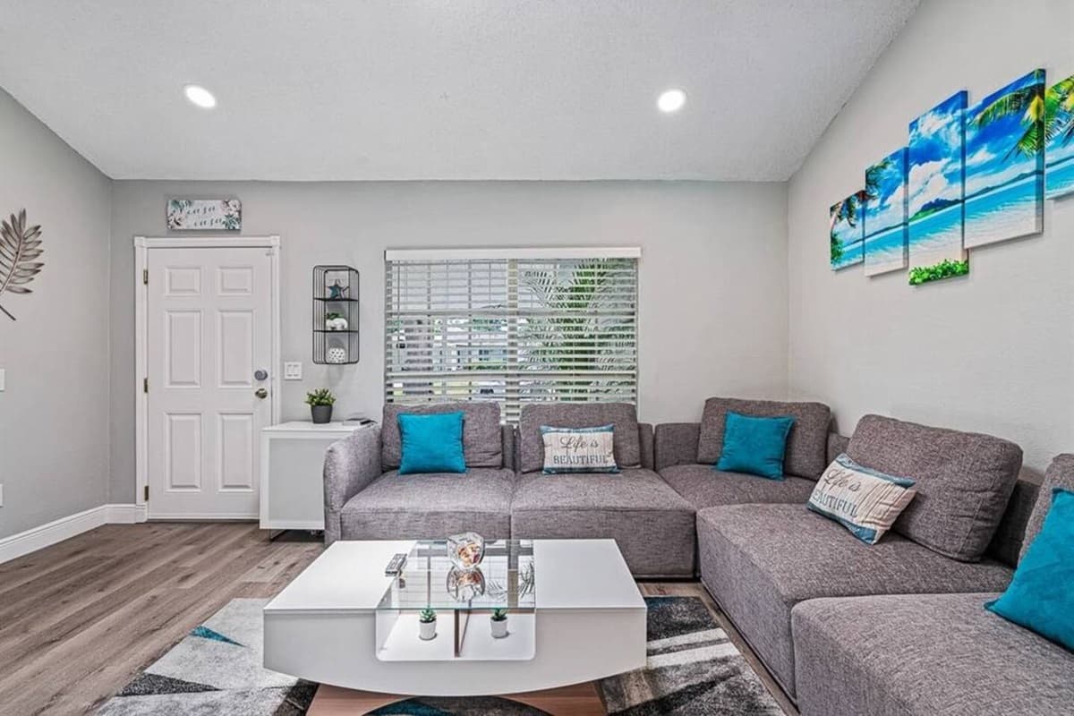 Behind our beautiful L-shaped couch is a big window with a street view and driveway. Love the space this living room has for the entire family or group of friends. Do you like what you see? send us an inquiry as soon as possible!