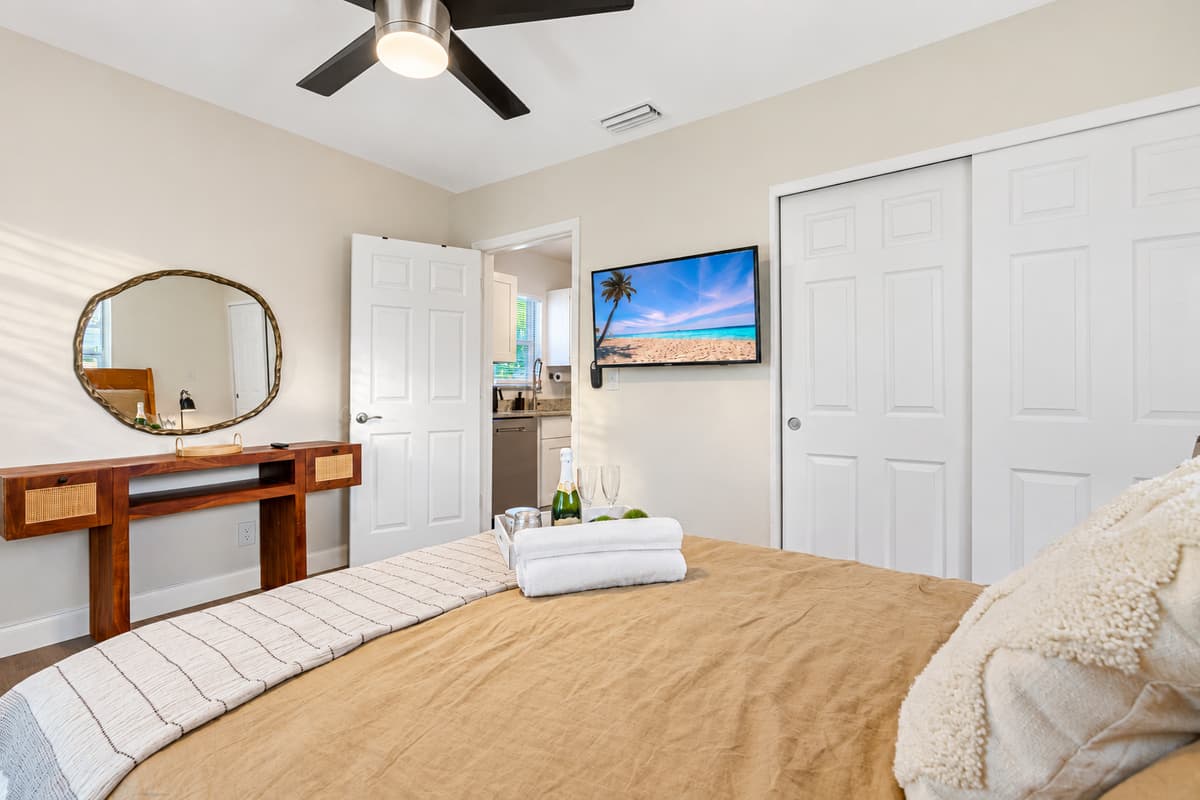 Our wonderful bedroom has a comfortable huge bed, closet, and vanity. This room also has its own TV.  Feel at home in your home away from home. 