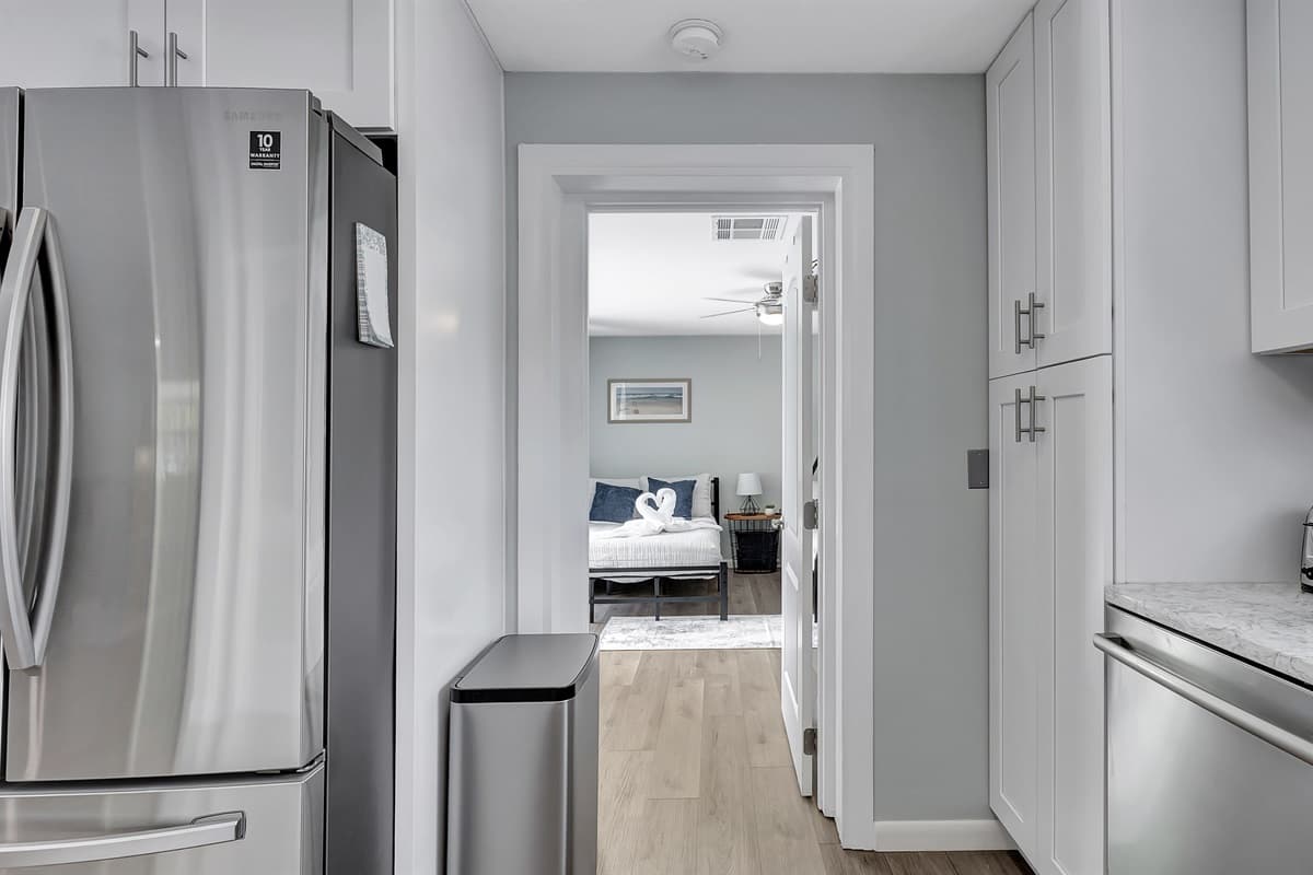 Step into our breathtaking kitchen, an embodiment of clean, modern design.