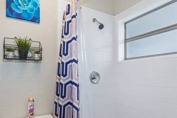 Lovely sparkling clean bathroom that has this beautiful walk-in shower, clean and fresh smelling toilet, sinks and drawers. Feel at home in your home away from home. Send us an inquiry as soon as possible!
