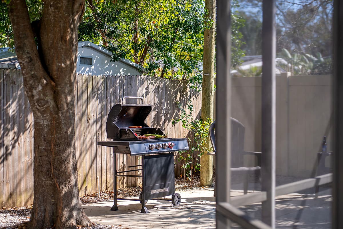 Enhance your outdoor experience with a fully equipped grill station, making poolside gatherings even more enjoyable.
