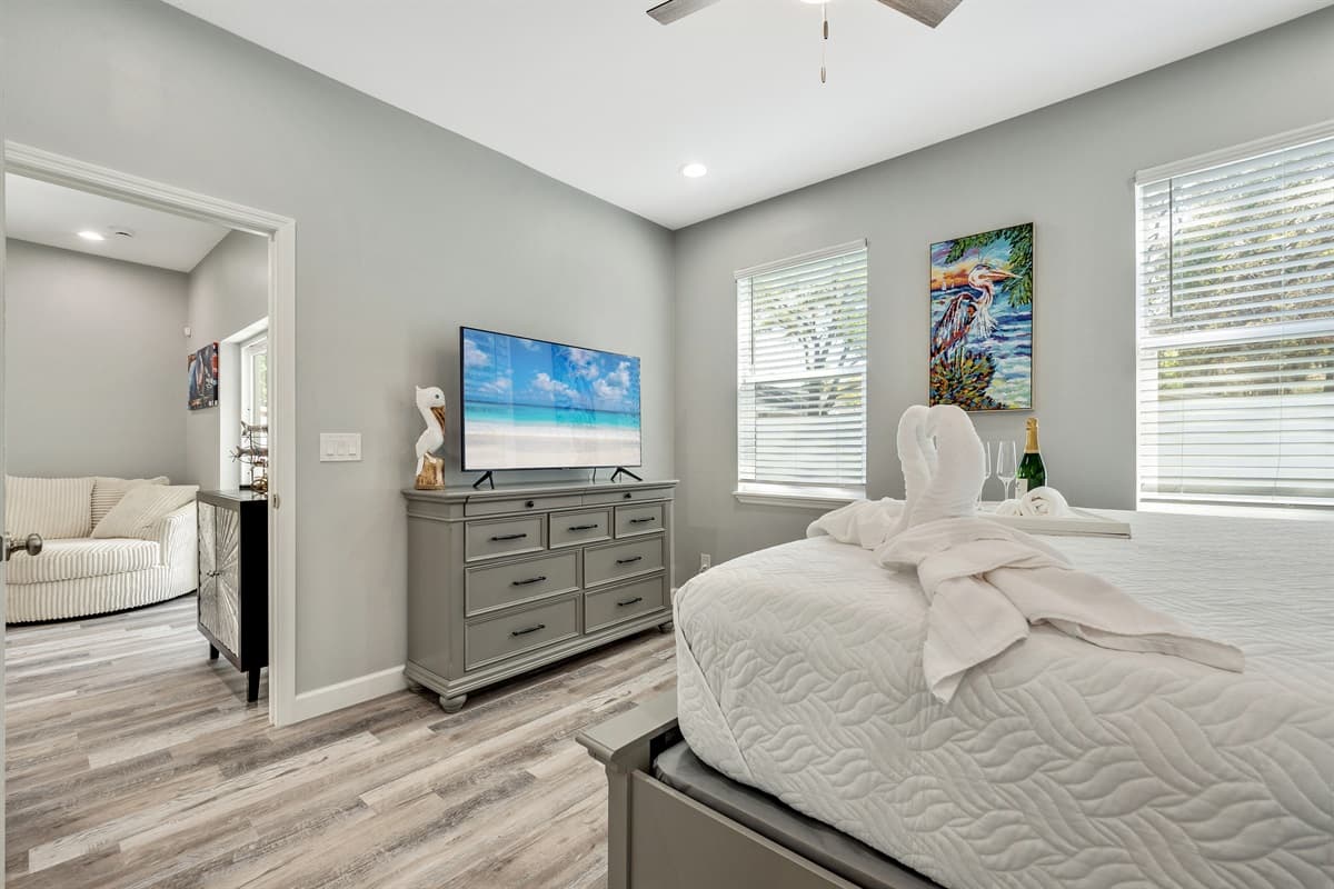 With its warm and inviting atmosphere, this bedroom invites you to settle in, unwind, and make yourself at home.