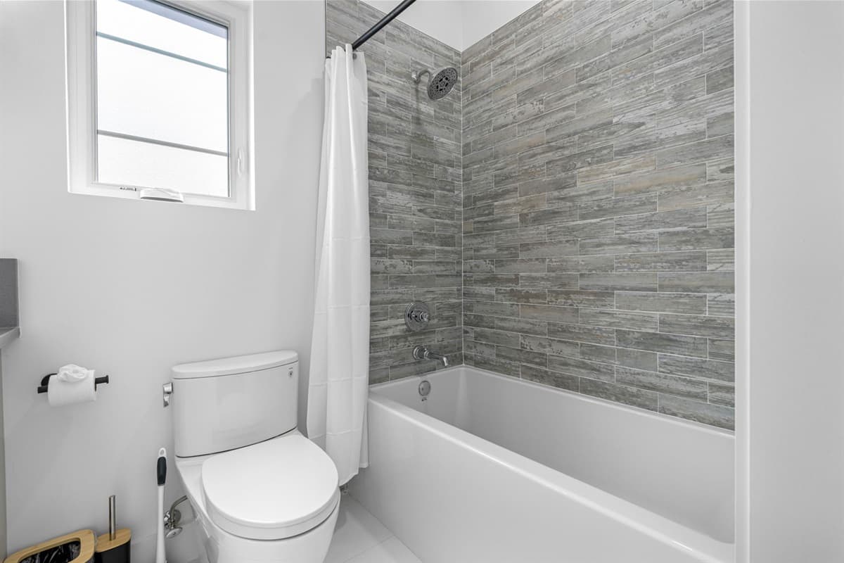 This bathroom provides a tranquil and stylish environment for your daily routines, offering both functionality and comfort.