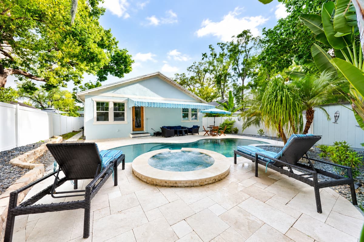 Lounge by the pool, soak in the spa, or simply enjoy the peaceful surroundings of your private backyard oasis.