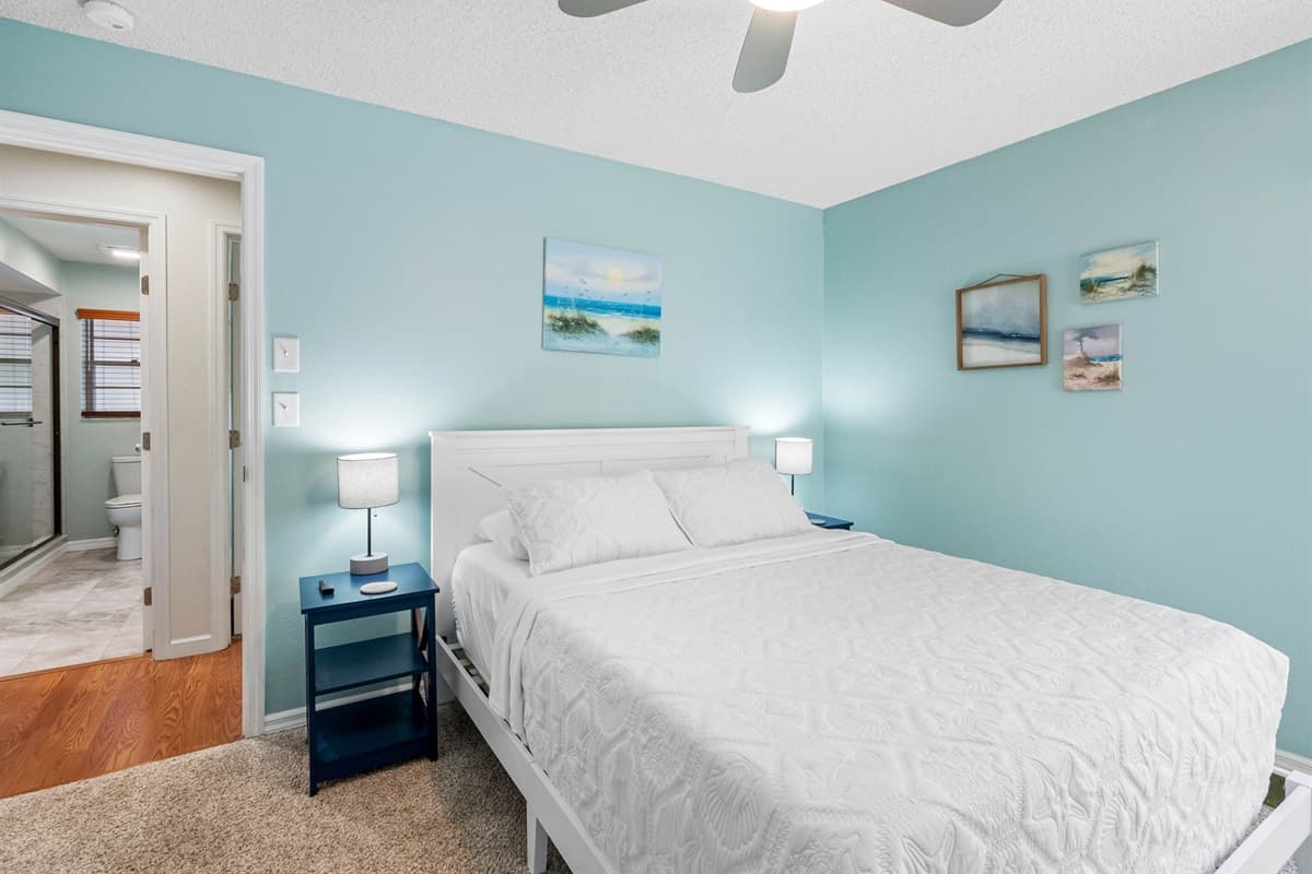 The room is thoughtfully decorated with minimalist accents that enhance the relaxed atmosphere without overwhelming the senses, allowing the beautiful colors and textures to shine.