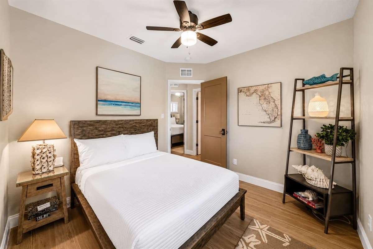 Relaxing guest bedroom with elegant accents, soft lighting, and a peaceful atmosphere for restful nights.
