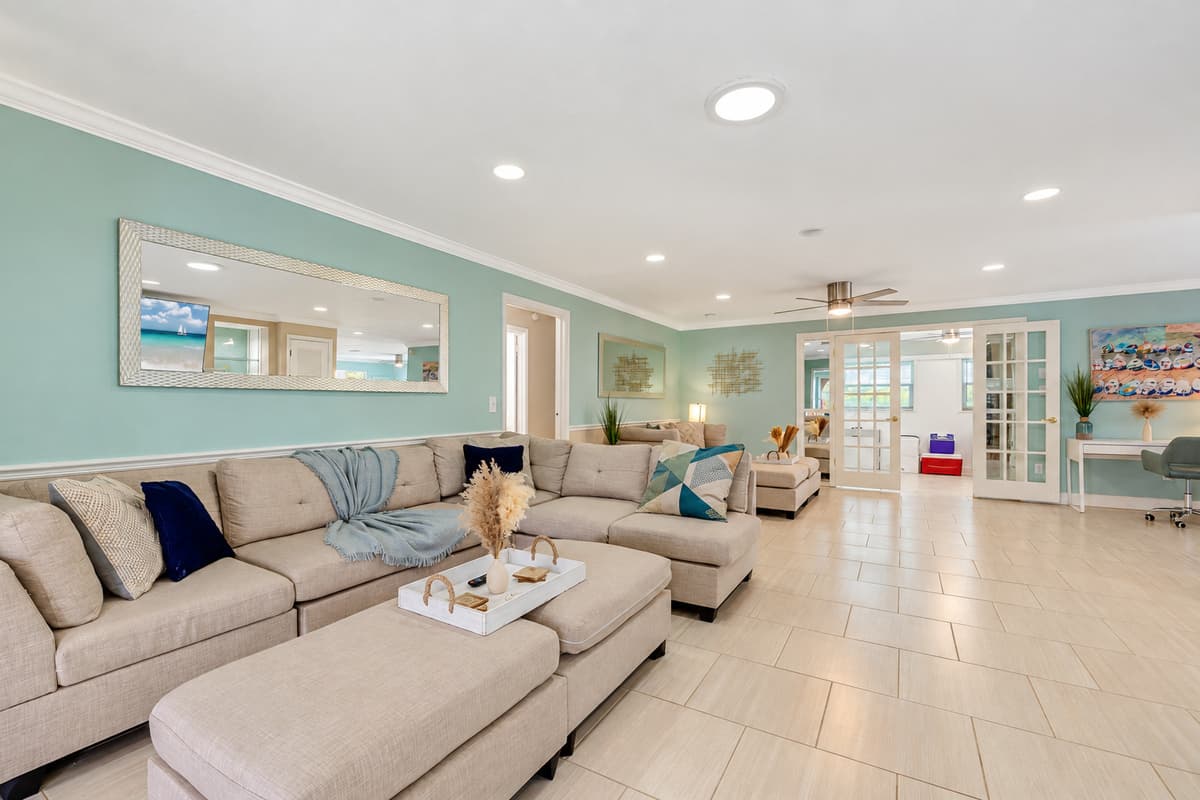 This inviting living space is designed for moments of joy and relaxation for the whole family.