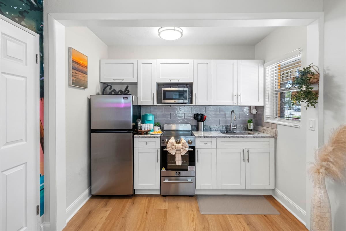 To enhance the overall experience, the kitchen is stocked with complete essentials – from premium cookware and utensils to high-quality dinnerware.