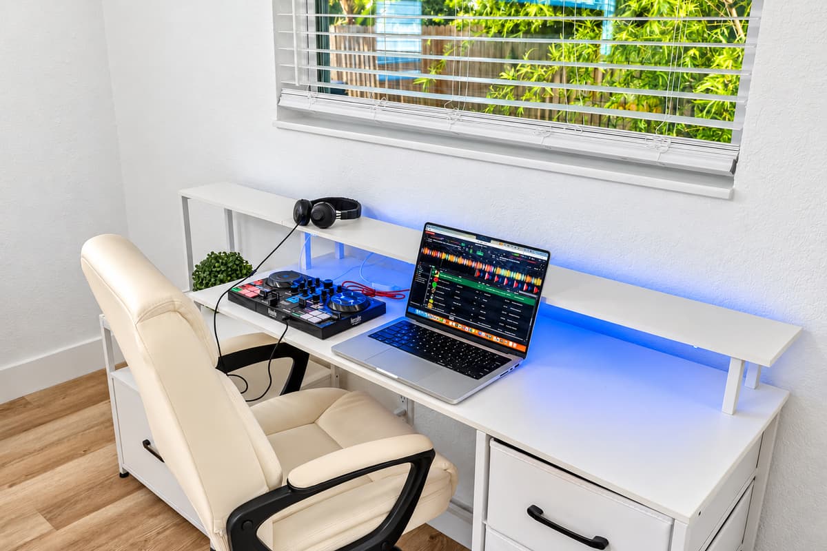 Whether you're here to unwind or work remotely, this bedroom is equipped with a full desk setup, modern lighting, and a restful bed for total versatility.