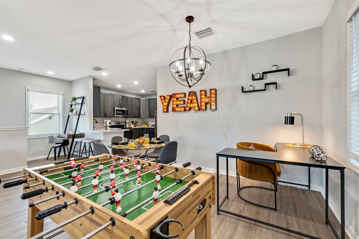 A timeless foosball table awaits, inviting you to indulge in the excitement of play and the camaraderie of friendly competition.