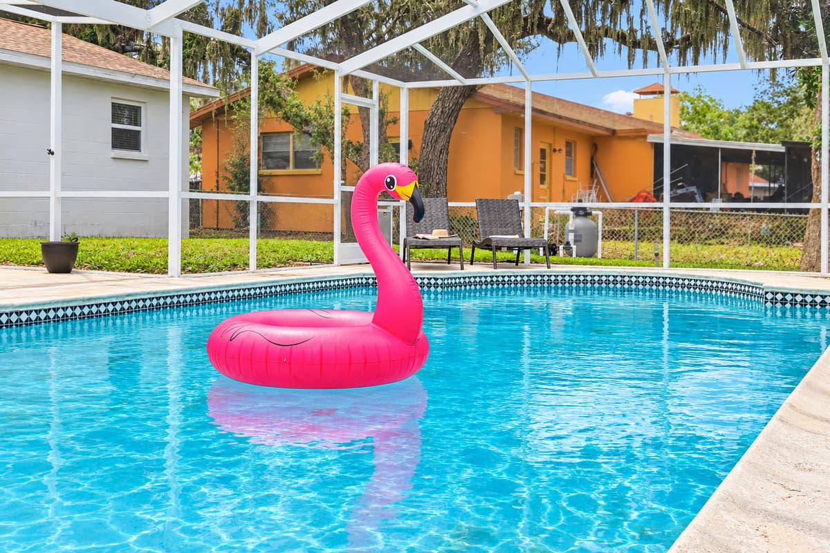 A screened pool oasis designed for comfort, safety, and year-round enjoyment.