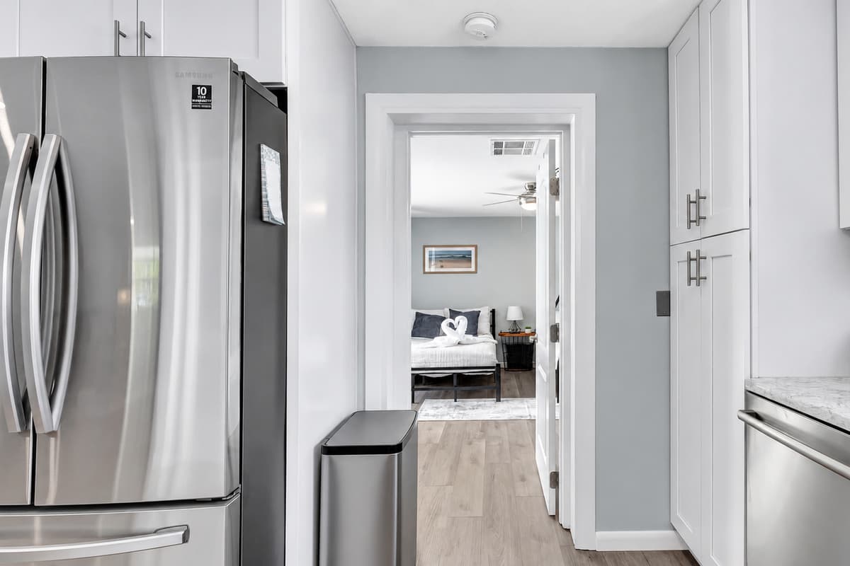 Step into our breathtaking kitchen, an embodiment of clean, modern design.