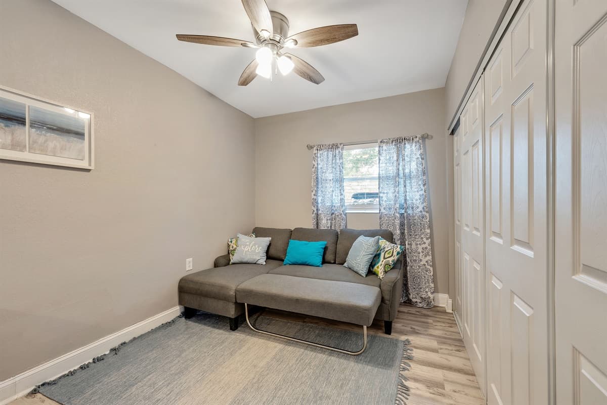 Discover the versatility of our master bedroom, where comfort meets convenience.