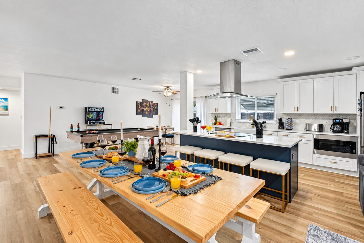 Enjoy meals together at this spacious table, just steps from the kitchen and game room.