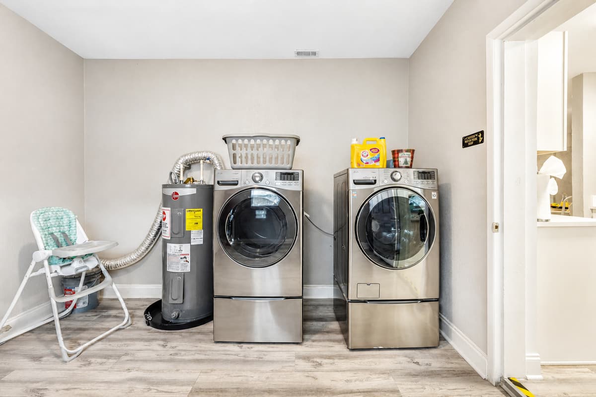 Our laundry area is not just a space for chores; it's a choreographed symphony of functionality and flair.