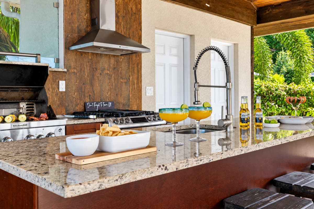 IMPORTANT NOTICE: Please note that the outdoor kitchen appliances are currently not functional, with the exception of the outdoor grill, which is fully operational and available for use.