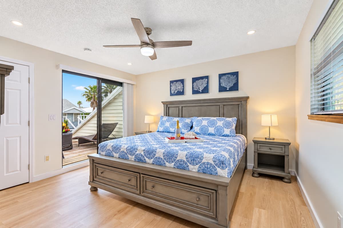 Welcome to our luxurious king-size bedroom with a stunning outdoor area that will take your breath away. Step into a world of comfort and elegance as you enter this spacious retreat fit for royalty.