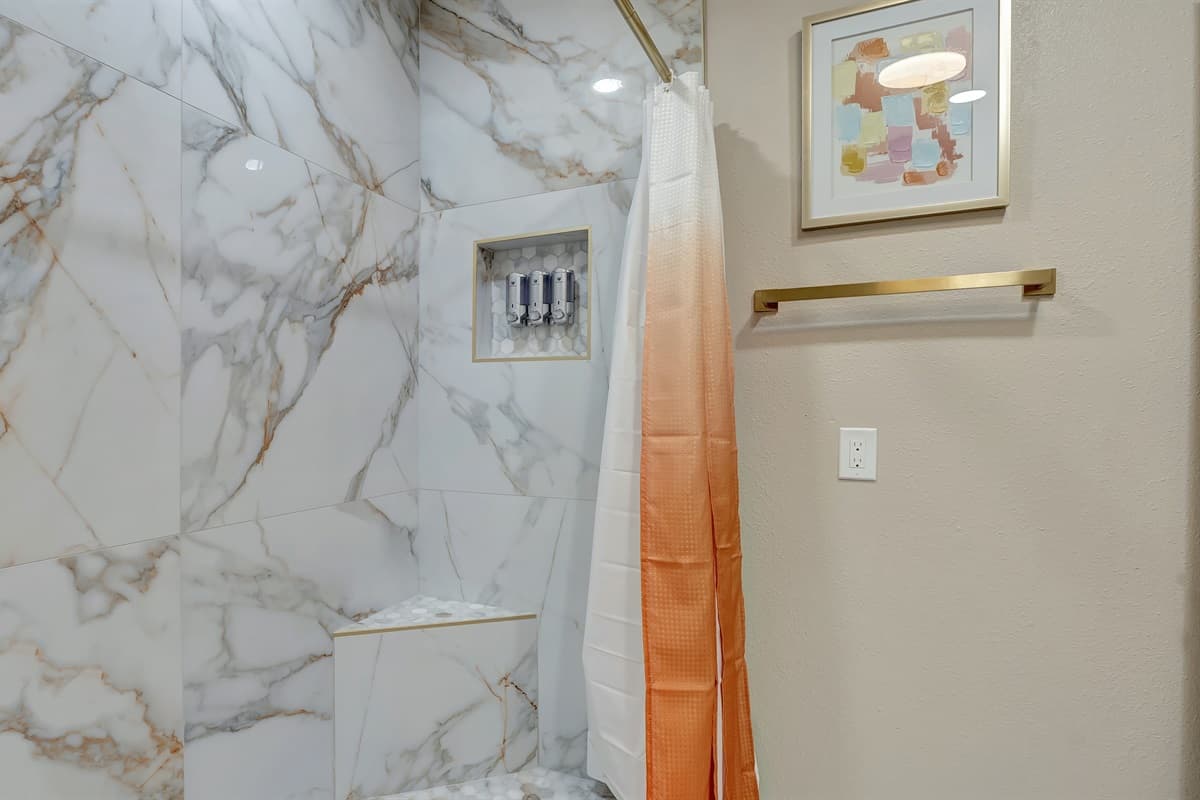 Step into our spacious walk-in shower and let cascading water envelop you in relaxation, making every shower a spa-like experience.