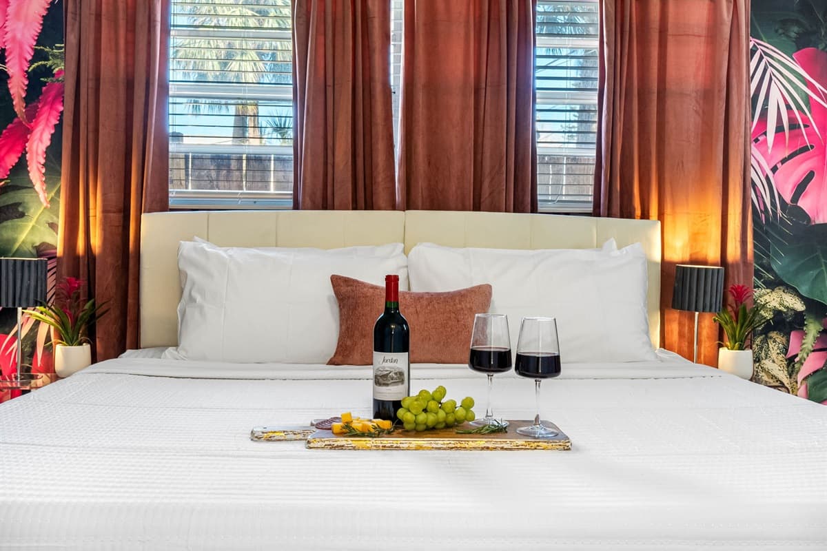 At the heart of it all is a king-size bed, a plush centerpiece beckoning you to unwind in coastal elegance.
