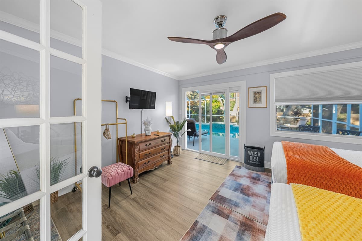 This welcoming bedroom is outfitted with two double beds and soft bedding for a comfortable stay.