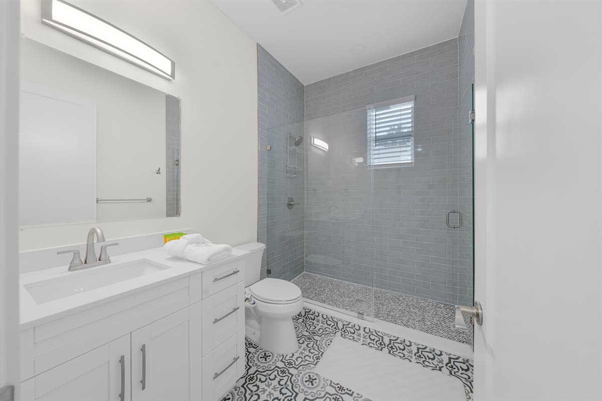 Spa-worthy bathrooms with walk-in showers, artisan tile floors, and modern fixtures. You might never want to leave.