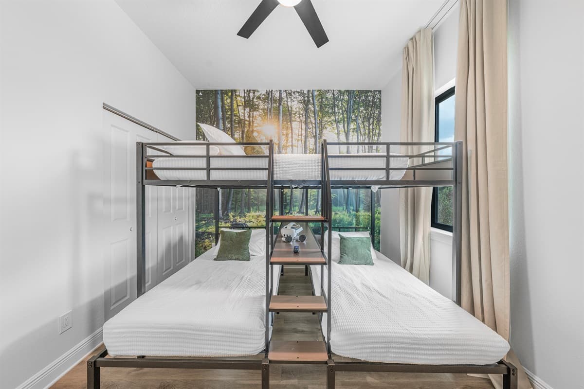 Front view of the bunk setup, showcasing multiple sleeping spaces in a clean and modern layout.