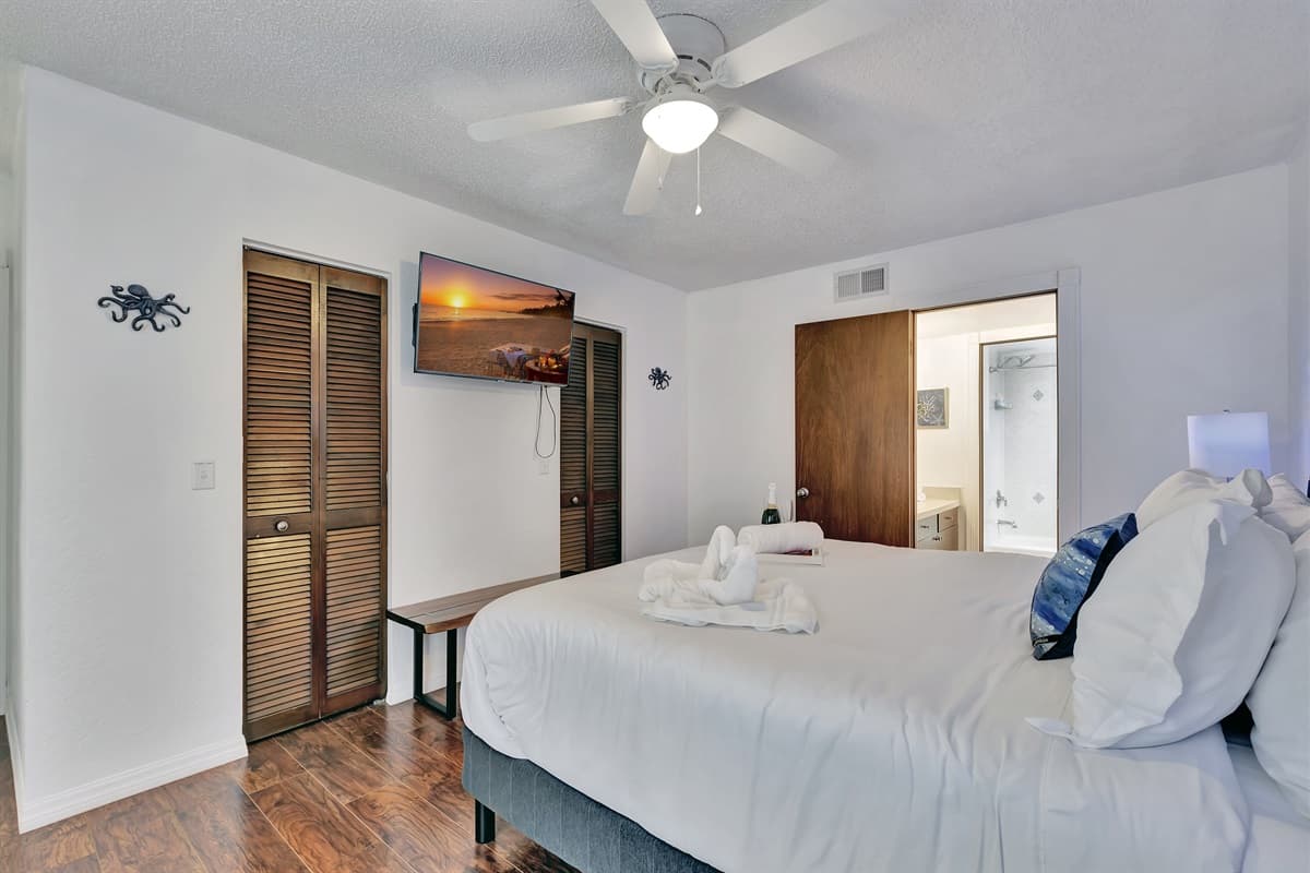 Soft lighting and tasteful decor complete the luxurious feel of this bedroom, making it a serene haven where you can escape from the world.