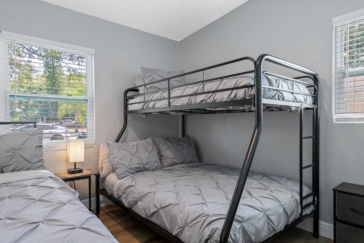 The queen size bed is perfect for a good night's sleep, while the bunk bed is great for children or extra guests.