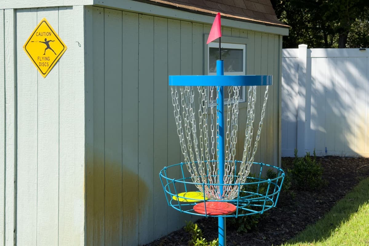 Play a round of disc golf or cornhole in the spacious fenced yard.