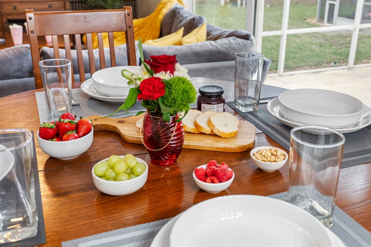 Bright and airy dining area with easy access to the kitchen and living room.