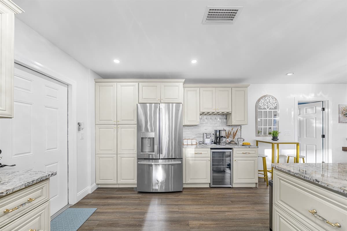 A thoughtfully designed kitchen featuring premium finishes, ample prep space, and everything you need for a comfortable stay.