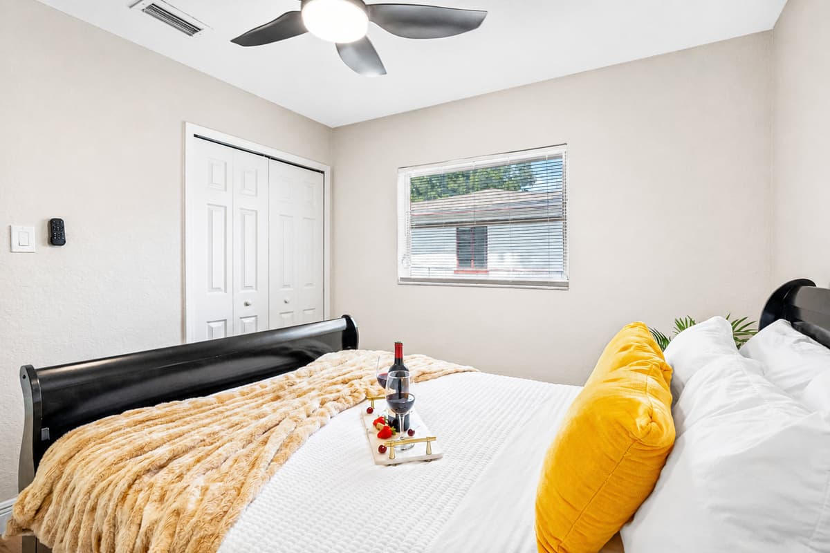 This serene space features a plush queen-size bed, ideal for couples or solo travelers looking to unwind after a day of exploring Tampa.