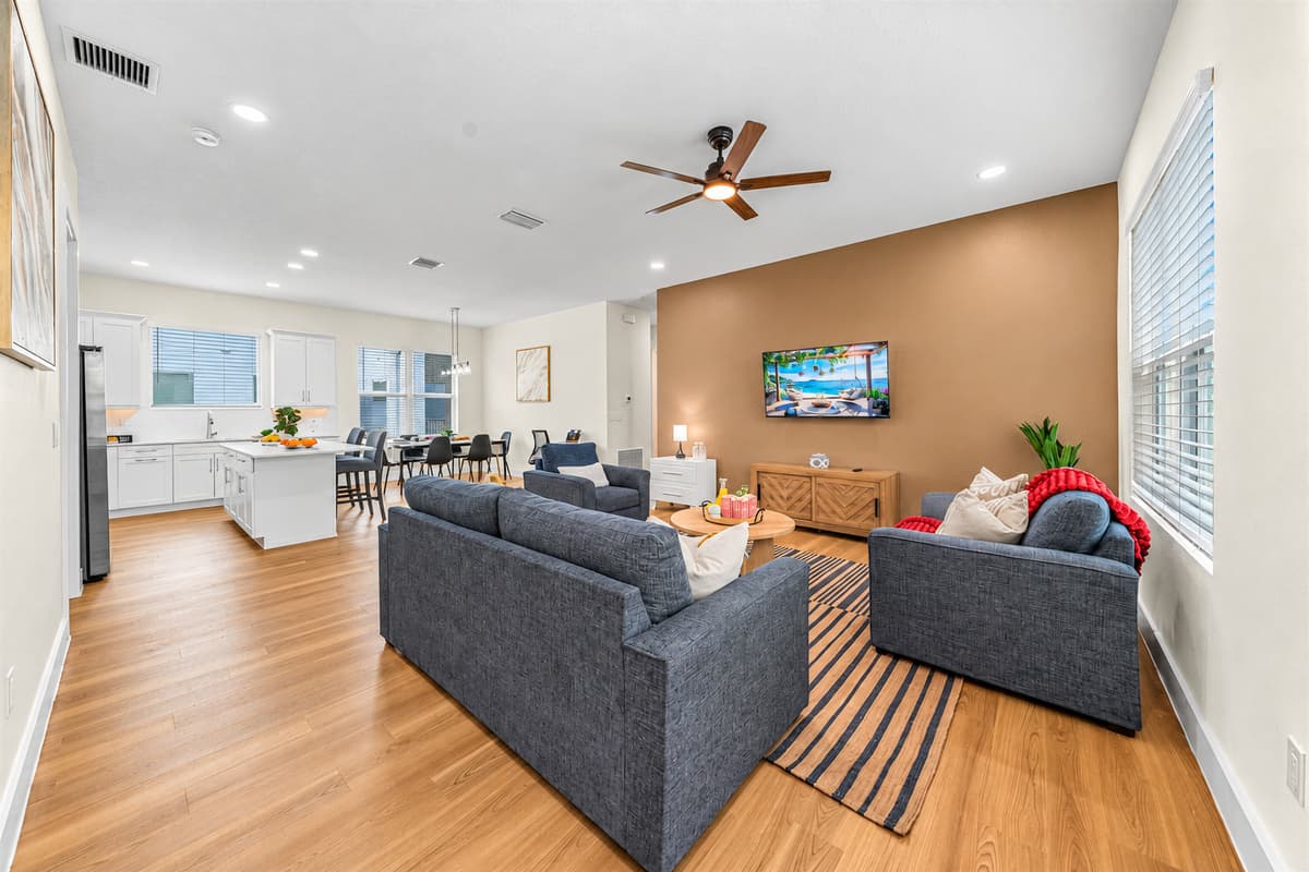 Wide-angle view of the open living space showcasing generous layout and modern design.