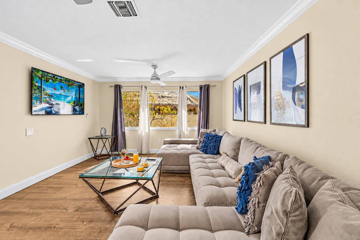 Unwind after a day of exploring in the spacious family room with plush sectional seating.