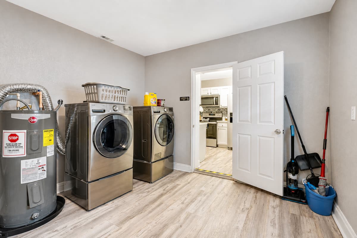 Our laundry area is not just a space for chores; it's a choreographed symphony of functionality and flair.