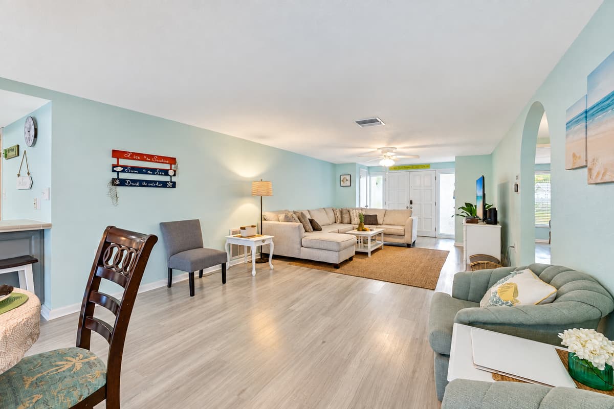 As you settle into the plush comfort of the grey couch, you'll find that every detail has been considered to elevate your experience.