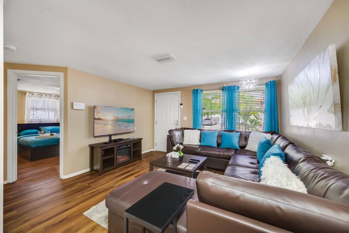 Who wouldn't love this beautiful living area with comfortable L-shaped couch? Have the best time with family and friends here! Book this property now!